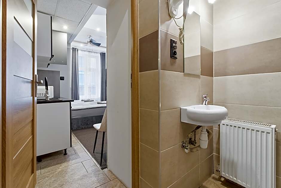 Queen Apartments