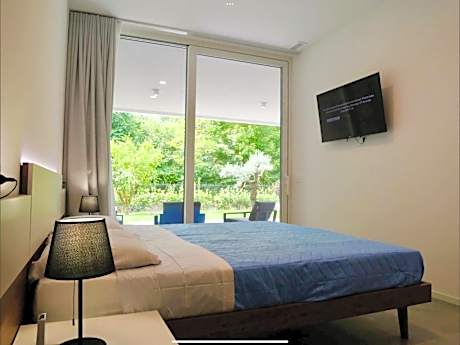 Deluxe One-Bedroom Apartment with Garden View