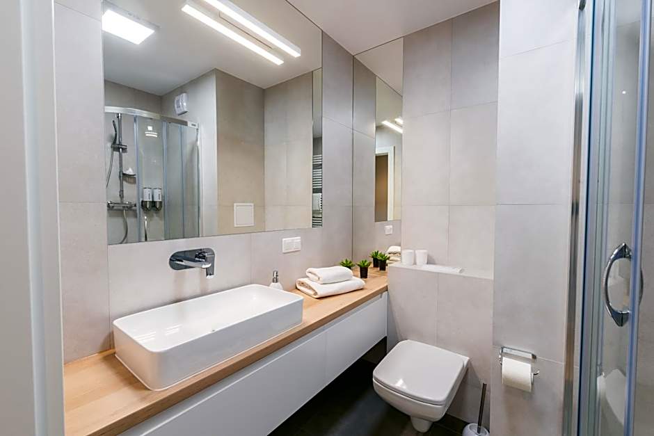 Q17 Apartments Rynek