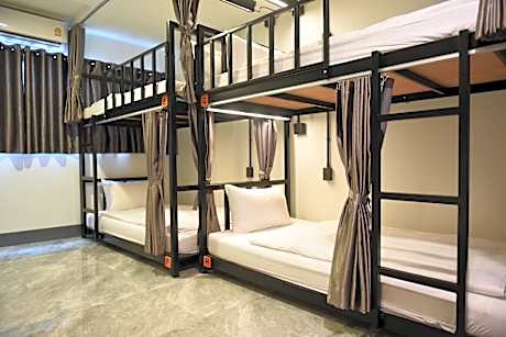 Bed in 8 Bed Mixed AC Dormitory Room with Shared Bathroom