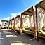 Olivia Palm Hotel