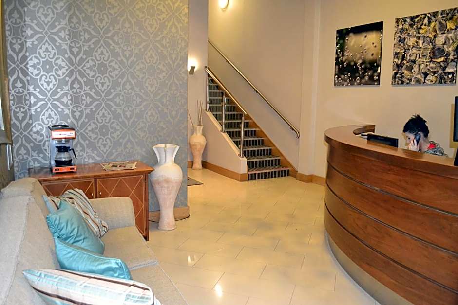 Carrick Plaza Suites and Apartments