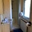 Shepherds Huts Ham Hill, 2 double beds, Bathroom, Lounge, Diner, Kitchen, dog friendly, Looking out to lake