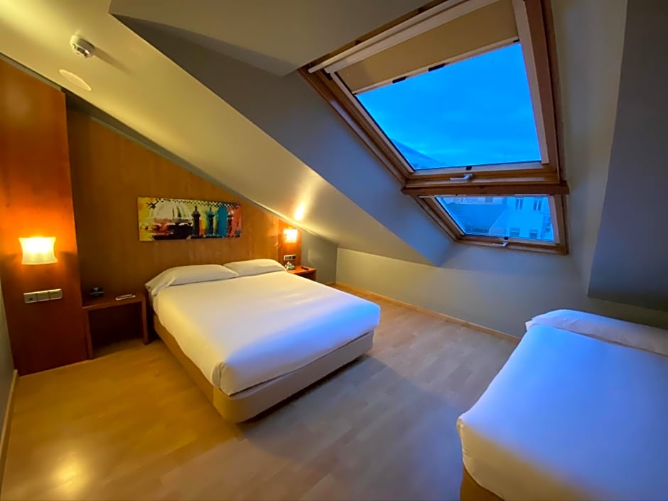 Photo 1 of 7 of Triple Room