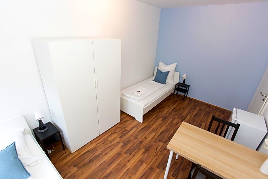 Zentral gelegene Zimmer mit Gemeinschaftsbad und Kuche